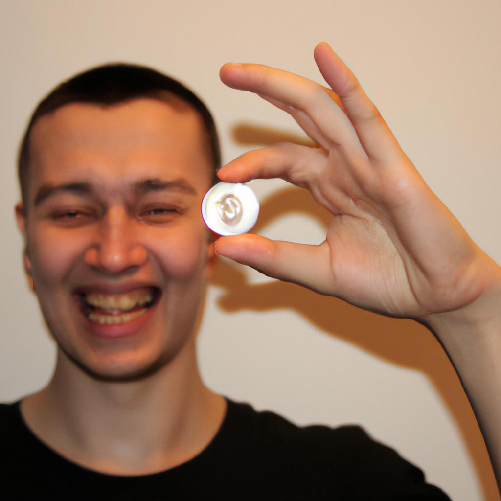 Person holding virtual currency, smiling