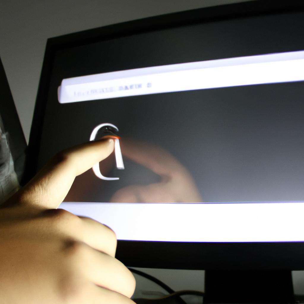 Person interacting with computer screen